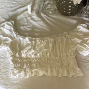 White cut off off the shoulder tee